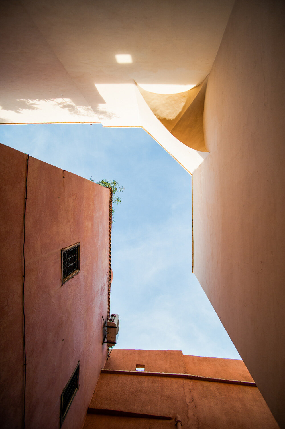 photo series captures the dusty rose hues blending morocco’s clay ...