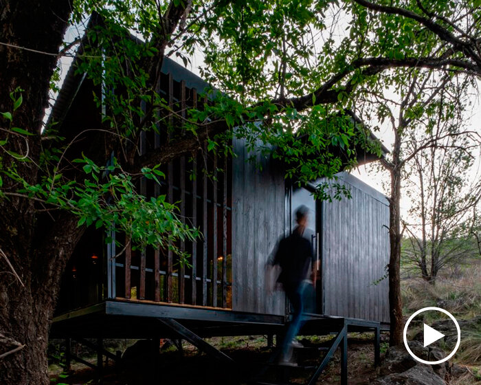 'little house on the river' forms an elevated shelter on a steep-sloping plot in argentina