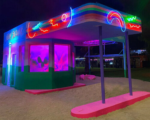 neon saltwater transforms 1930s las vegas gas station into retro landscape of glowing lights