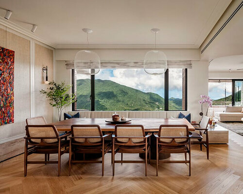 black and white checkerboard tiling flows all over 'parkview' apartment in hong kong