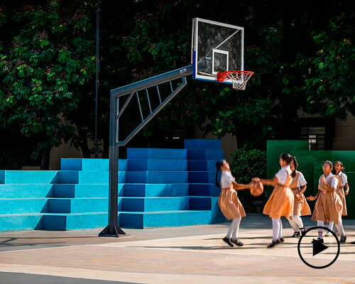 vibrant bleachers raise up in steps for multipurpose school field in india