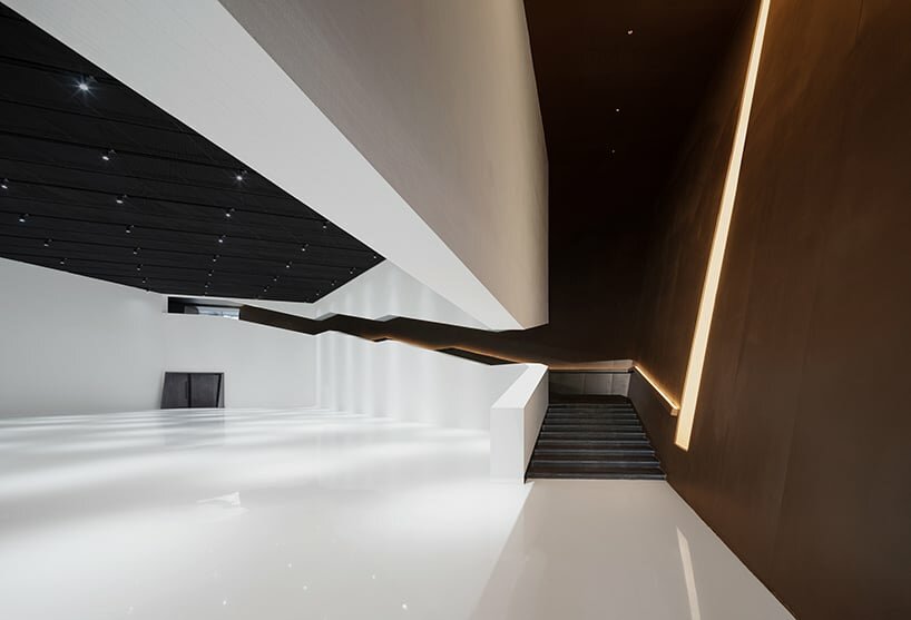 linear and angular strip lights in the interior set a dynamic tension