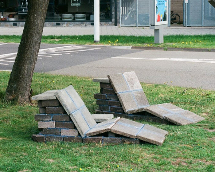 'stacked street' re-curates the city, transforming forgotten bricks & curbs into street furniture