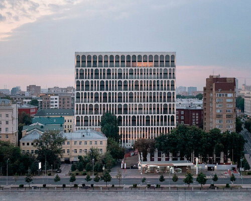 arched facade enfolds residential building in moscow revisiting venetian palazzi architecture