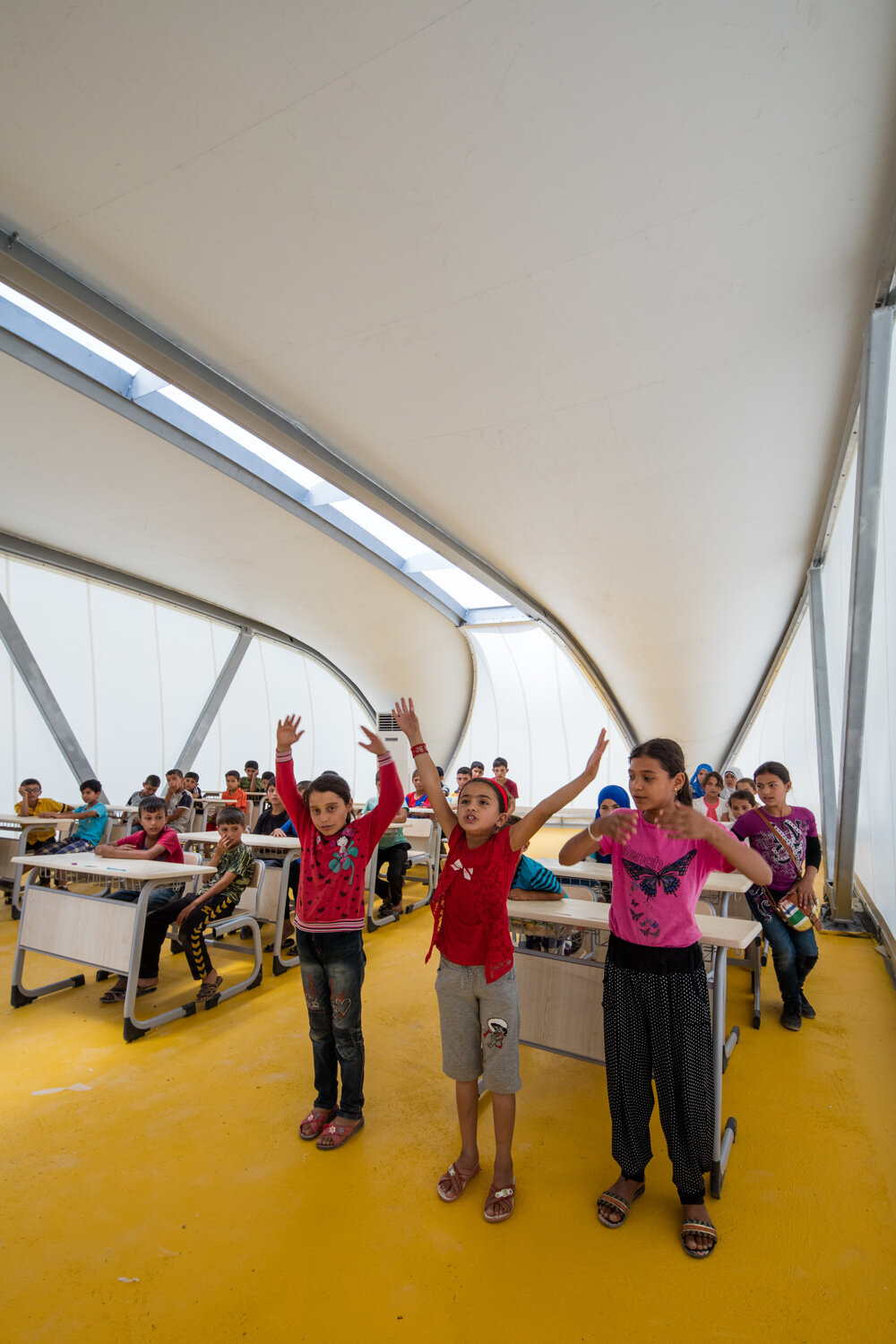 zaha hadid designs 27 tents as schools, clinics and shelters for ...