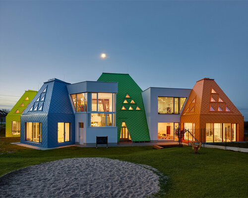 protruding, colored 'sheds' define architektura's kindergarten design in the czech republic