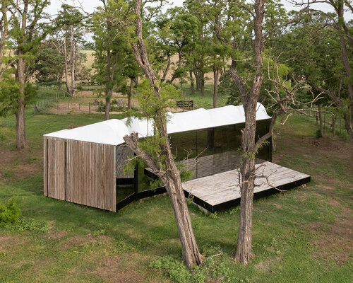 DUB arquitectura tops its 'atelier-A' with an undulating roof of translucent fabric