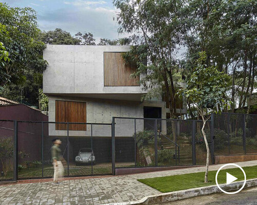 'casa elemental' is a shifted stack of concrete blocks by estúdio zargos