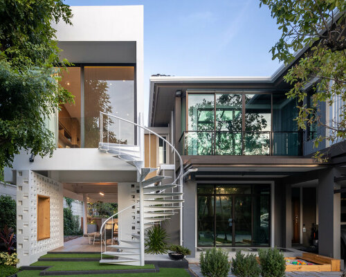 fattstudio adjoins sheltered recreational space to existing move-in-ready home in thailand