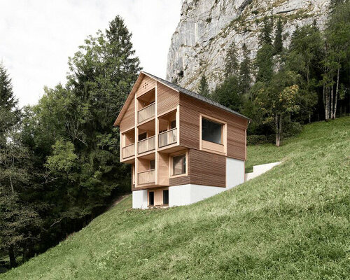 innauer matt perches secluded timber house along mountainous landscape in austria