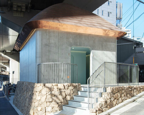 pastel green and overhead lights brighten up marc newson's public toilet in tokyo