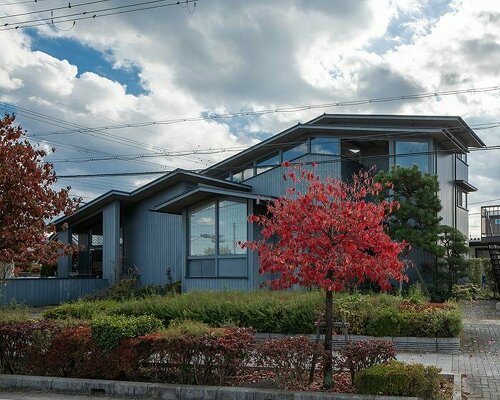 overlapping gable roofs afford openness for 'leading house' by FORM / kouichi kimura