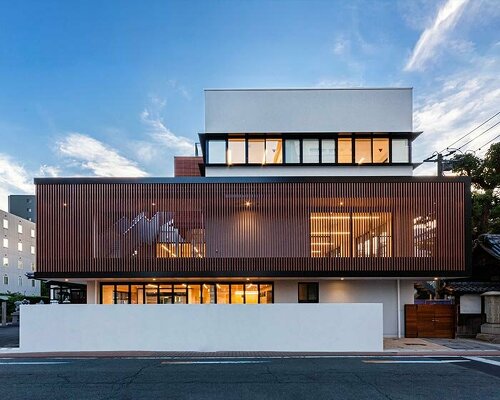 permeable vertical louver envelops HIBINOSEKKEI + youji no shiro's RJ nursery in japan