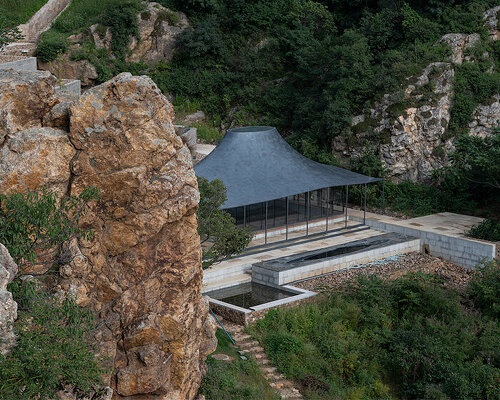 sculptural carbon fiber roof funnels light into atelier deshaus' meditation hall in china