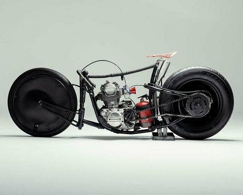 stripped motorcycle design combines spare car wheels, vintage kawasaki engine & bike seat