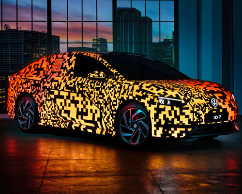 volkswagen's fully electric sedan ID.7 glows in neon and zoomed-in QR codes for CES 2023