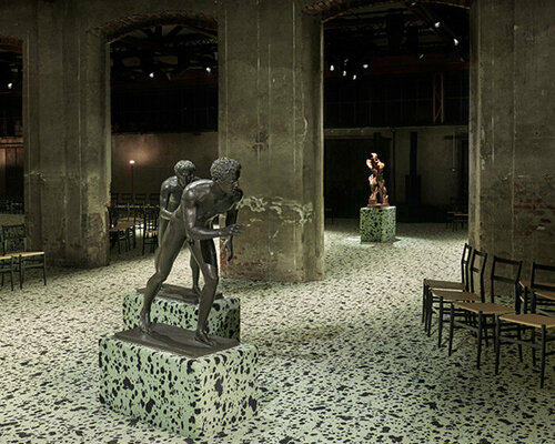 bottega veneta's FW23 show unfolds among futurist boccioni statue & ancient roman bronzes