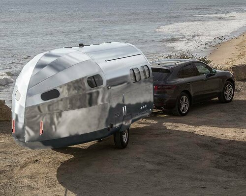 bowlus clads bullet-shaped travel trailer in silver armor