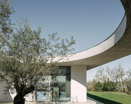 bold concrete geometries embrace bruno dias' casa chouso in a portuguese village