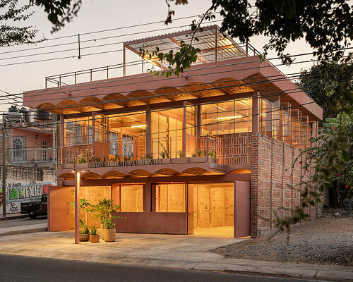 vaulted brickwork community center built by the citizens adorns rural mexico