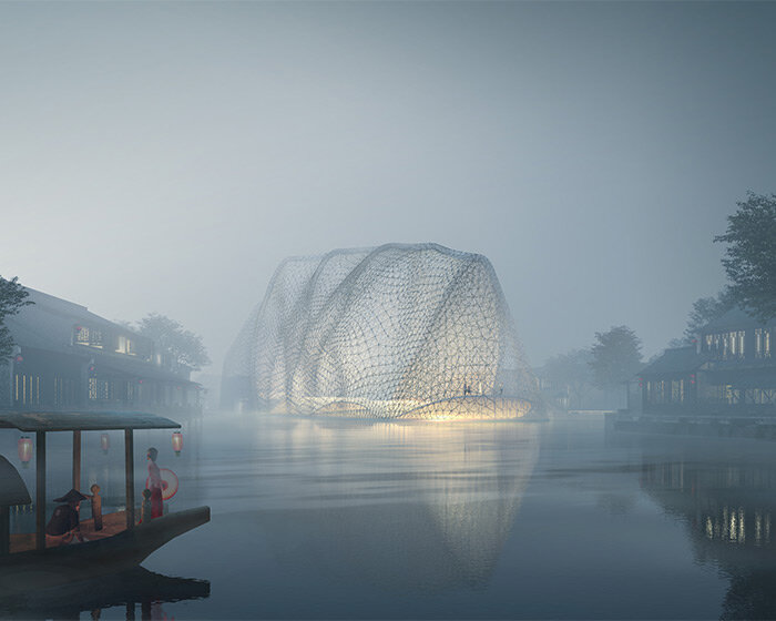 kazuyo sejima's floating design center appears like a sophisticated dome-enclosed island in china