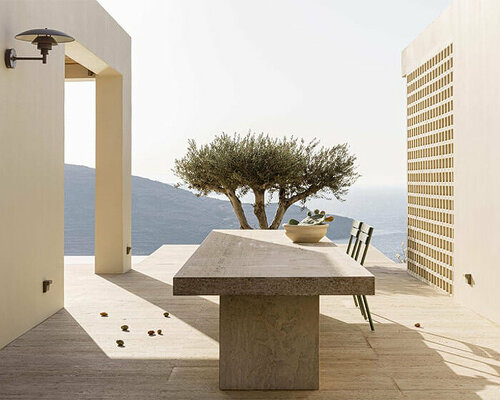 studiokontodimas unveils cluster of perforated volumes for quiet cliffside villa in greece  