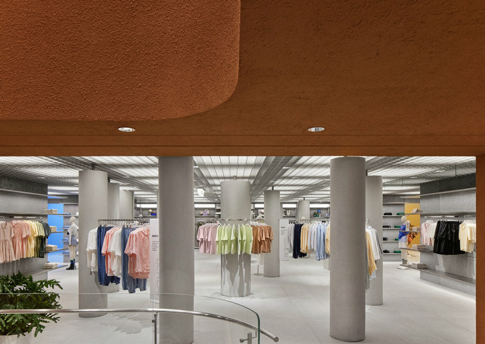 woven bamboo installation by AIM architecture drapes over fashion store ...