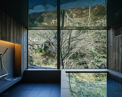 kubo tsushima architects reflects river onto mirrored hotel-spa ceiling in japan