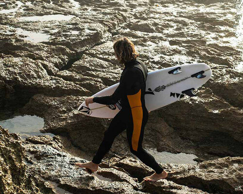 recycled oyster shells and limestone minerals shape deeply's sustainable wetsuits