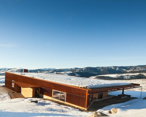 new caelifera cabin's angular geometry echoes origami folds and sawtooth mountain peaks