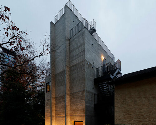 not a hotel's exclusive new branch in tokyo rises like a towering monolith