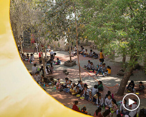 circular openings breath views of nature and light into rural school extension in india