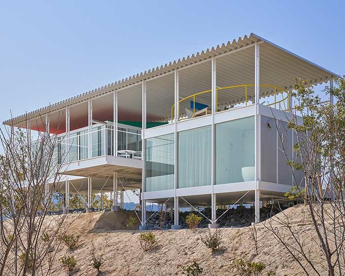 shigeru ban's art museum and recreated iconic villas compose simose facility in hiroshima