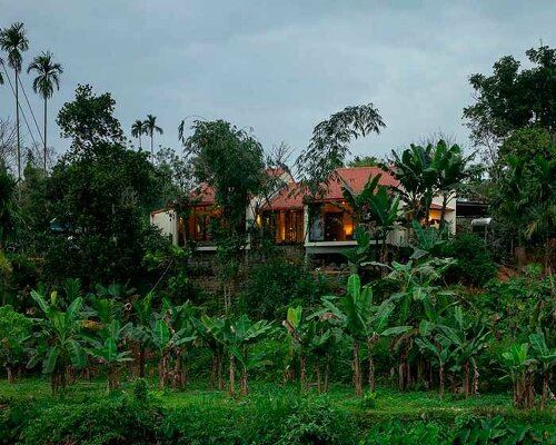 overlapping shingle roofs shield multileveled tien cam house in vietnam