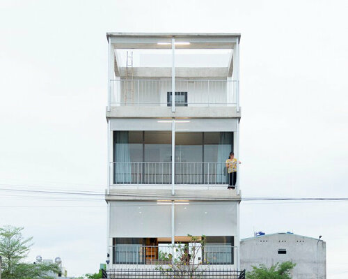 semi-transparent blinds cover the narrow front of 2713 house in vietnam