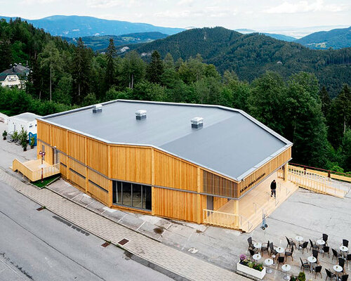 regional larch wood makes up sustainable mobile concert hall in austrian hillside