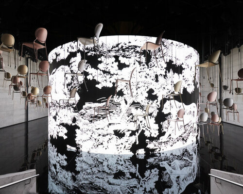 philippe starck suspends miss dior chairs in enchanting carousel scenography at design week