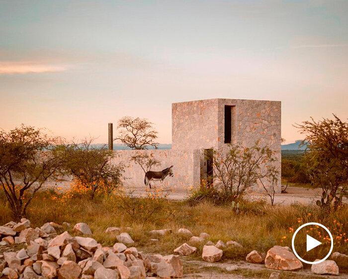 dispersed stone volumes and alleys develop a cruciform residential plan in mexico