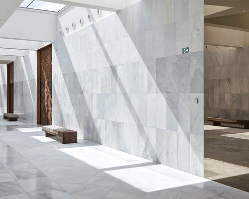 step inside KAAN's marble-clad extension for historic het loo palace in the netherlands