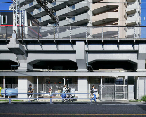 abandoned space under tokyo town railway line is revived as a nursery school