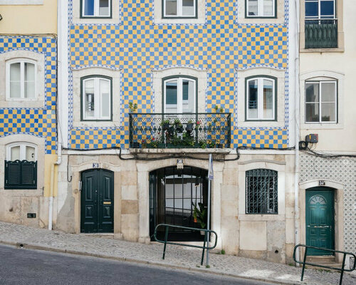 ala.rquitectos transforms disjointed lisbon apartments into spacious, light-infused office