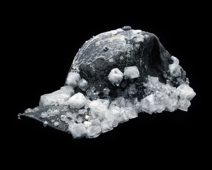 on alice potts’ baseball caps, human sweat crystallizes and mutates into frozen gems