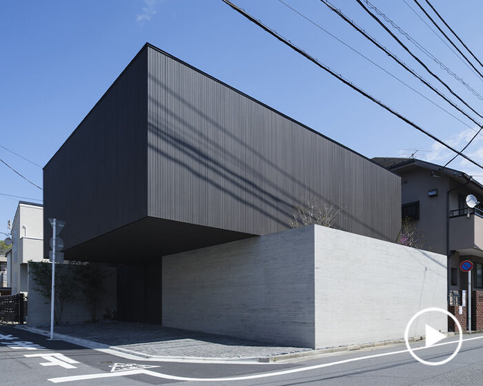 stacked cubes of lumber and concrete shape apollo architects' 'LAXUS' house in tokyo