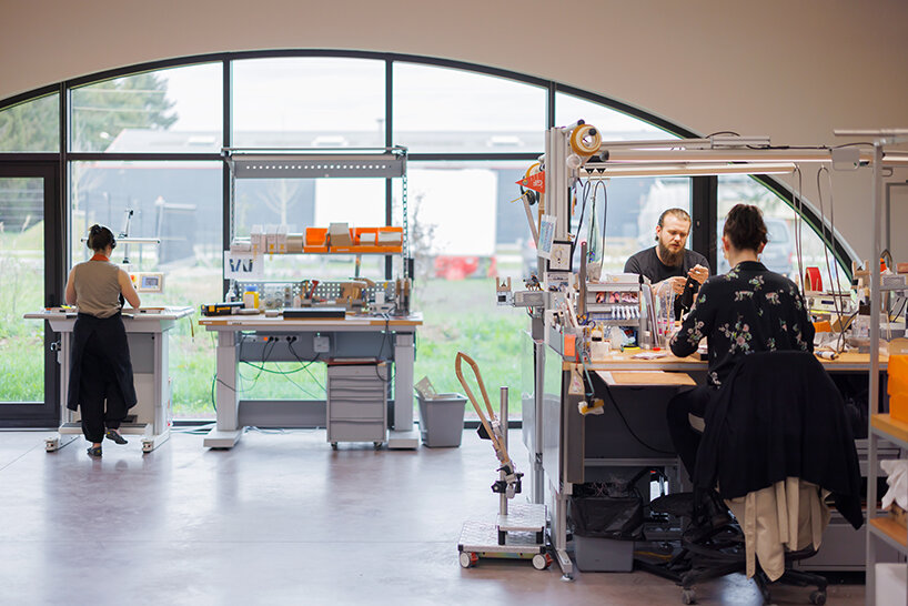 lina ghotmeh brings sweeping arches to new hermès workshop