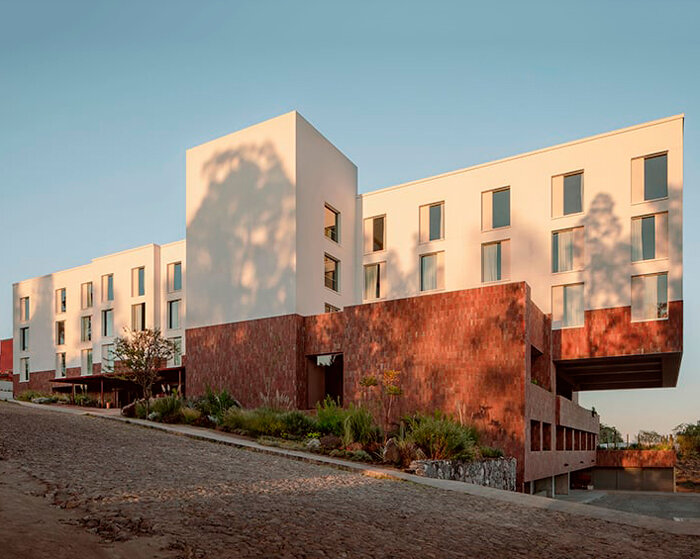 vibrant stone tiles adorn PRODUCTORA + esrawe studio's hotel in mexico