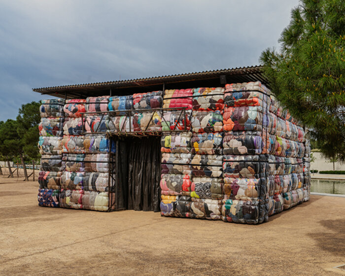 the nest collective's outdoor installation in athens evokes a dystopian waste landscape