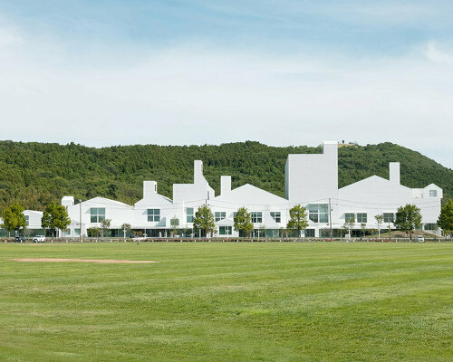 sou fujimoto revives ishinomaki cultural center as a row of gabled volumes