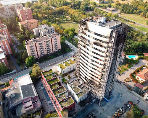 white dynamic ring loggias envelop the restored torre antonini in milan