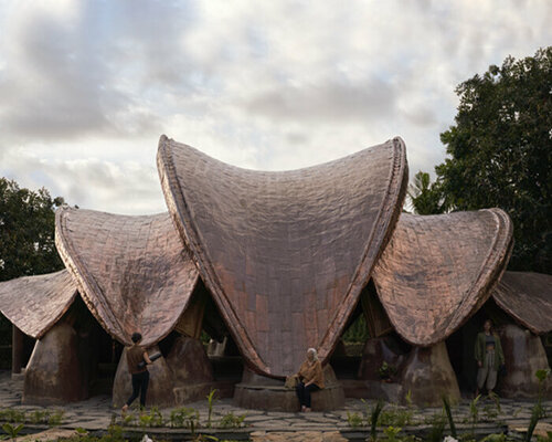 IBUKU's alchemy yoga center unfolds as three sculptural, copper-clad bamboo shalas in bali