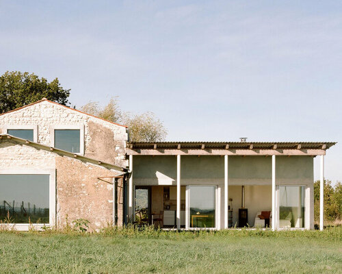 old and new textures interplay in the extension of renovated old farm in france